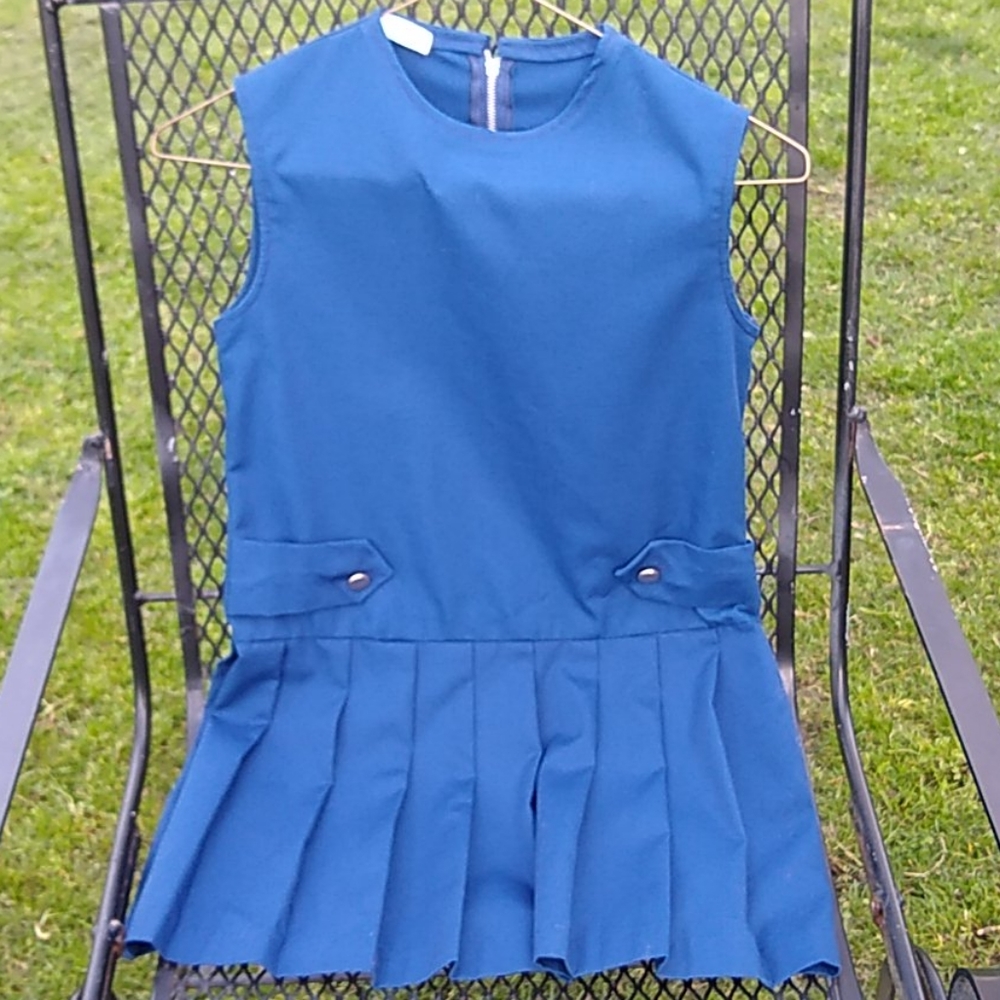 Child's sleeveless pleated dress